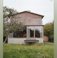 a house with a bench in front of it