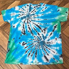 Tye Dye T-Shirt Size 3x With Green, Light Blue And Black Dye. Shirt Is New Unworn Only Newly Dyed By Jrsdesignsltd. Handmade In Maine With Casual Bleached Blue Top, Casual Blue Bleached Top, Hand Dyed Graphic Tee With Short Sleeves, Hand Dyed Short Sleeve Graphic Tee, Hand Dyed Blue Graphic Tee, Hand-dyed Graphic Tee With Short Sleeves, Blue Hand Dyed Graphic Tee, Casual Hand Dyed Blue Top, Blue Hand Dyed Crew Neck Top