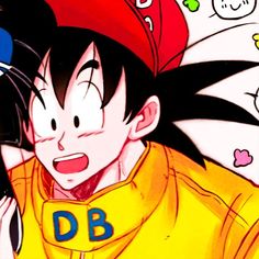 an anime character holding a cell phone in his hand and wearing a yellow shirt with the letter db on it