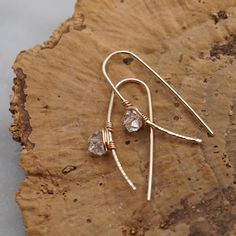 A cute twist on a Kundi classic! These threaders are made of 18 gage 14k gold filled wire with AAA grade Herkimer Quartz Diamonds. Herkimer is known as the crystal of attunement as it enhances and clears the energy of objects all around you. Adjustable Teardrop Wire Jewelry, Minimalist Wire Wrapped Crystal Earrings As Gift, Delicate Wire Wrapped Earrings For Everyday, Dainty Adjustable Wire Wrapped Earrings, Minimalist Adjustable Wire Wrapped Wrap Earrings, Dainty Wire Wrapped Earrings For Everyday, Dainty Wire Wrapped Everyday Earrings, Gold Hand-wrapped Wrap Earrings As Gift, Gold Hand Wrapped Wrap Earrings As Gift