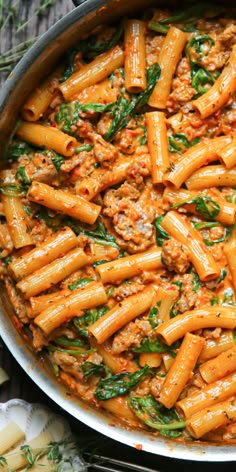 Creamy Sausage Rigatoni with Spinach, Garlic, and Tomato Cream Sauce in a stainless steel pan. Tuscan Rigatoni, Creamy Sausage Rigatoni, Rigatoni Recipe, Rigatoni Recipes, Oven Meals, Tomato Cream Sauce, Resep Pasta, Italian Sausage Recipes