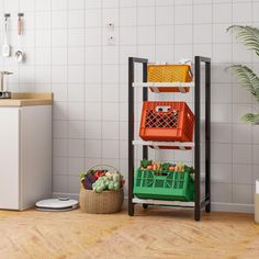 a kitchen with white tile walls and wooden flooring, an orange basket is on the shelf