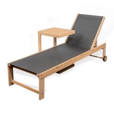 a lounge chair with a table on the back and one seat folded down to it's side