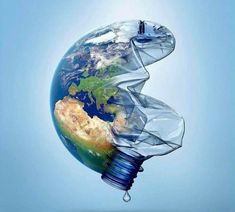 a water bottle shaped like the earth is floating in the air with its plastic wrapper wrapped around it