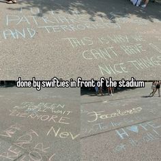 some people are writing on the pavement with chalk