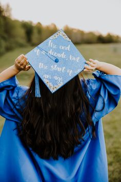 Picture of the back of girl (long, wavy, Black hair) and her cap that says “The end of a decade, but the start of an age” Long Live Taylor Swift Graduation Cap, Taylor Swift Cap And Gown, Graduation Cap Decoration Taylor Swift, Taylor Swift Inspired Graduation Caps, Grad Cap Designs Taylor Swift