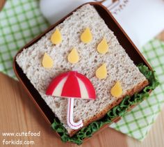 a sandwich with an umbrella decoration on it