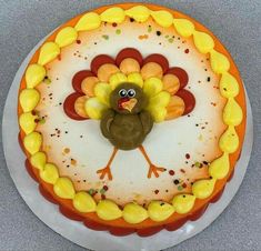 a decorated cake with a turkey on it