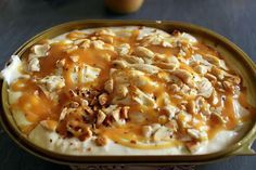 a bowl filled with food sitting on top of a table