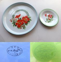 two plates with flowers painted on them are next to the same plate that has been made