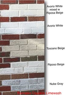 the side of a brick wall with different colors and names on it, including red, white, and brown