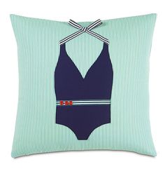 a blue and white striped pillow with a bathing suit on it