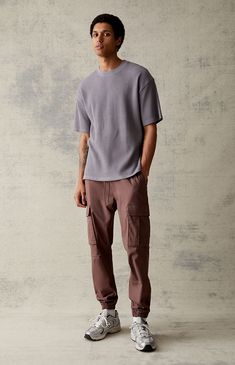 PacSun makes it easy to go casual with the new Performance Brown Slim Cargo Jogger Pants. This go-to pair is designed with an elastic stretch waistline, adjustable drawstrings, side pockets, cargo pockets, an elasticated hem, a slim fit, and a performance nylon composition. Cargo Joggers Outfits, Cargo Jogger Pants, New Balance Outfit, Pacsun Mens, 2024 Outfits, Joggers Outfit, Black Cargo, Cargo Joggers, Mens Joggers