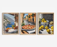 three paintings of lemons and a pizza on a table in front of a window