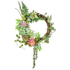 a wreath with flowers and greenery hanging from it's side on a white background