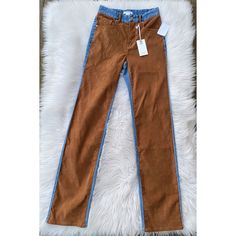 -New With Tags -Good American Icon Faux Suede & Denim Jeans -Size: 2 -Straight Leg Jeans -Stretch Denim With Contrast Panels Of Faux Suede On Front Of Jeans And Top Of Back -Slim Silhouette -5 Pockets -High Rise; 11” Rise -72% Cotton, 11% Modal, 9% Elasterell-P, 7% Recycled Material (Fiber Content Unknown), 1% Elastane -Machine Wash, Line Dry -Waist Laid Flat Measures 13”, Hips Laid Flat Measure 17” -32” Inseam *These Chic Jeans Are An Elevated Version Of Classic Straight Leg Jeans, Featuring In Trendy Brown Denim Pants, High Rise Brown Denim Jeans, High Rise Brown Bottoms For Winter, Trendy Brown Denim Bottoms, Brown Denim Pants For Fall, Trendy Fitted Brown Jeans, Fitted Brown Jeans For Spring, Fitted Brown Spring Jeans, High Rise Brown Denim Pants