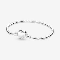 Express your love with the Pandora Moments Engravable Heart Clasp Snake Chain Bracelet. Hand-finished in sterling silver with threaded ends to keep charms safely secured, this is the first Pandora Moments bracelet to feature an engravable clasp. The heart-shaped clasp is flat and polished on both the back and front to allow for engraving, with the Pandora logo featuring on the side. Gift this piece to someone special, complete with a message that comes from the heart. - Pandora Moments Engravabl Pandora Logo, Custom Charm Bracelet, Custom Charm Necklaces, Rose Gold Plated Ring, Bracelet Pandora, Snake Chain Bracelets, Mesh Bracelet, White Gold Necklaces, White Gold Earrings