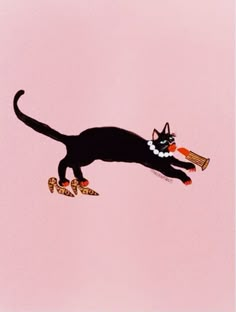 a black cat is flying through the air with some shoes on it's feet