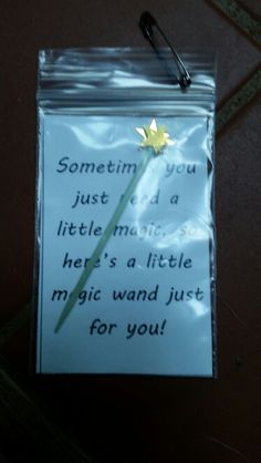 a note attached to a piece of paper with a flower on it that says, sometimes you just need a little magic here's a little magic for you