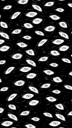 an abstract black and white photo with lots of eyes