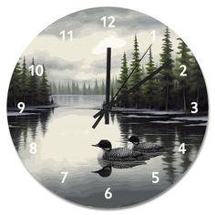 a clock with two ducks in the water and trees on it's sides, painted by hand