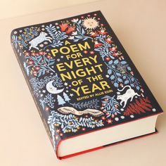 a poem for every night of the year is written in an intricately decorated book