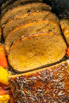 a close up of meat and vegetables in a pan with the title vegan turkey roast