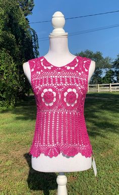 "Lacy Crochet Tank Top.  Great with a camisole underneath or as a bathing suit coverup.  Looks great with jean, shorts, or a skirt.   1. Pink top - made with cotton yarn  - 32\" wide and 20 in\" long from shoulder to bottom. 2. Blue top - made with cotton yarn - 40\" wide and 24 in\" long from shoulder to bottom. 3. Custom order - message me with color Custom Orders usually take about 2-3 weeks to create (not including shipping time). However, depending on the number of orders I have, it could take more or less time to make the item and ship it to you. If you need it by a certain day, feel free to message me and I can let you know if that will be possible!Dress form used is a size medium." Spring Festival Lace Top With Crochet Trim, Fitted Tank Top For Spring Beach Party, Bohemian Lace Top With Crochet Trim For Festivals, Bohemian Lace Top For Festivals, Bohemian Fitted Lace Top For Vacation, Fitted Bohemian Lace Top For Vacation, Summer Crochet Lace Top, Crochet Lace Top For Festival Beachwear, Bohemian Crochet Lace Top For Beach