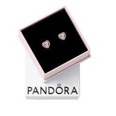 PRICES MAY VARY. Sparkling Stud Earrings: Show your ears some love with these Sparkling Elevated Heart Stud Earrings and make a statement with every look PANDORA Timeless Collection: A timeless, elegant, and versatile collection with sparkling stones as their centerpiece, for those you cherish and those that cherish you Features CZ: Cubic zirconia could be said to be the jewel in PANDORA's crown, making up the majority of stones we use in our jewelry because it optically looks like a diamond PANDORA Rose: If you're looking for luminosity and a warm glow that's flattering to every skin tone, discover the 14k Rose Gold-Plated Collection featuring our unique metal blend that is plated with a romantic pink-colored 14k rose gold Official PANDORA: This authentic piece of PANDORA jewelry is ready Rose Gold Cubic Zirconia Heart Earrings For Anniversary, Anniversary Rose Gold Heart Earrings With Cubic Zirconia, Rose Gold Heart Cut Earrings For Mother's Day, Rose Gold Heart Earrings For Gift, Cubic Zirconia Earrings For Anniversary, Pandora Jewlery, Earrings Pandora, Crown Making, Pandora Rose Gold