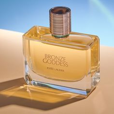 Best-Selling Women's Fragrances & Perfumes | Estée Lauder Estee Lauder Bronze Goddess, Tiare Flower, Bronze Goddess, Perfume Reviews, Estée Lauder, Womens Fragrances, Floral Fragrance, Estee Lauder, Women Perfume