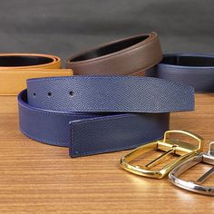 These leather belts are made from full grain leather - Epsom Hass leather. Inspired by the design of famous brand leather belts, these blue mens belts can be used with old belts buckle to replace old belts strap. Or not, you can use belts buckle as shown in the description photo. Because it is made by leather crafters so it can be customized according to requirements: Length, thickness, leather color, stitching color, style.    I also embross stamping personalized text free of charge if requested. ✔️PRODUCTS INCLUDE: -Custom blue Epsom leather belt -Stainless steel buckle(option) -Punching tools ✔️PRODUCT DETAILS: -Frontside: Epsom leather -Color: Blue -Backside: Cowhide leather -Stitching color: Blue (Can be Cutomized) -Belts Width : 32mm/35mm/38mm -Belts length: Custom(Maximum length: 12 Luxury Blue Leather Belt, Luxury Blue Formal Belt, Luxury Blue Belt For Formal Occasions, Blue Leather Belt Buckles With Removable Belt, Elegant Blue Leather Belt, Luxury Belts With Leather Lining, Leather Strap Belts And Suspenders For Business, Custom Leather Belts, Belt Without Buckle