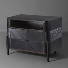 a black and grey dresser with two drawers