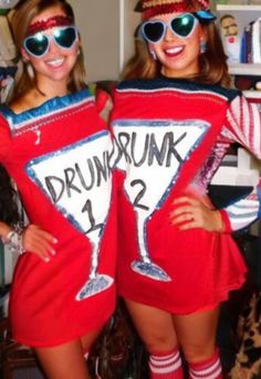 two girls dressed up in costumes for halloween