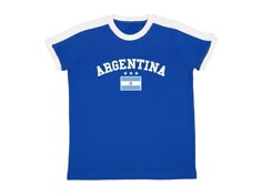 Argentina Baby Tee Blue ringer t shirt with white contrast collar, arched Argentina graphic, Argentinian flag and stars. Blokette and soccer inspired jersey shirt. #sporty #coquette #blokecore #handmade #summer Available in sizes small, medium, and large Measurements (in inches): Small- Width: 16 Length: 21.5 Medium- Width: 18 Length: 23 Large- Width: 19 Length: 25 Care Instructions: * Do not dry clean * Wash and dry inside out * Hang dry (preferred) or machine dry on a delicate setting * Use co Flag Print Crew Neck Tops For Sports Events, Sports T-shirt With Flag Print In Cotton, Sports T-shirt With Flag Print, Team Spirit Short Sleeve Tops With Three Stripes, Sporty Coquette, Argentina Shirt, Argentinian Flag, Summer Vacation Shirt, Argentina Flag