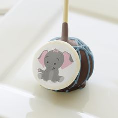 a chocolate candy with an elephant on it sitting on top of a white countertop