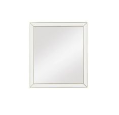 a white framed mirror on a white wall with a light green border around the edges