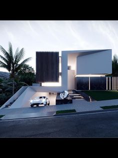 a car is parked in front of a modern house