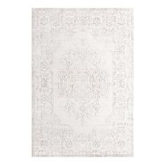 a white rug with an intricate design on the front and back side, in shades of gray