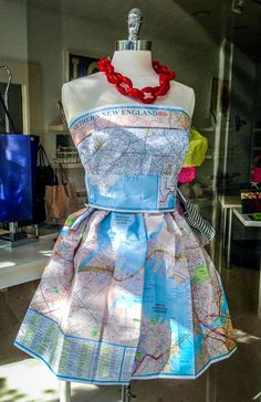 a mannequin with a map dress on display