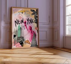 an empty room with a new york poster on the wall