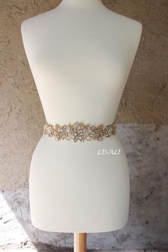 "LISALI Sparkly Wedding Belt, Bling Belts, Rhinestone Belt, Wedding Belts, Bridal Belts, Rhinestone Chain Belt, Crystal Sash Belt Made of - This beautiful sash is made with sparkly rhinestones details, very elegant. - Beading Measures 21\"L X 2\"W (at the widest point, other 1.5\"W) - satin ribbon - your color choice - 108\" long (2.5 m) , made to tie a bow in the back Sophisticated and elegant bridal belt. Shipment from NY,US.Fast shipping,fast delivery.Shipping fee is not refundable. For any q Fitted Gold Sash For Wedding, Wedding Dress Belt Gold, Gold Crystal Bridal Belt For Party, Bedazzled Belt, Elegant Gold Bridal Belt With Sashes, Elegant Gold Bridal Belt With Rhinestones, Luxurious Gold Bridal Belt With Embellishments, Wedding Dress Belts, Gold Crystal Bridal Belt For Wedding