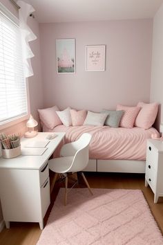 a bedroom with pink walls and white furniture