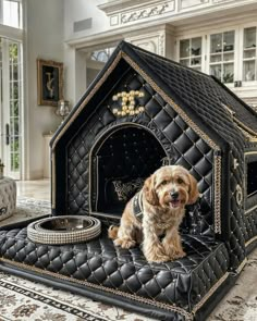 a dog is sitting in its house bed