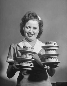 a woman holding coffee cups with the caption'probably drink to much coffee, possibly break