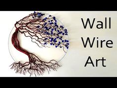 the words wall wire art are displayed in front of a white plate with a tree on it