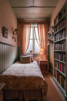 a bed sitting in a bedroom next to a book shelf filled with lots of books