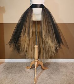 "I CAN MAKE THIS TUTU IN ANY COLOR AND SIZE, PLEASE NOTE THE EXACT TULLE AND RIBBON COLOR AT CHECK OUT (Without note I will make it same color with 1st list photo in black over gold front open hi lo tutu). 1ST PHOTO TUTU LENGTH FRONT 20'' KNEE LENGTH, BACK 44'' FLOOR LENGTH, FOR HEIGHT AROUND 5'3'' wear a couple inches of heels . This tutu is made with 200-400 yards of 6'' wide fine tulle so it's super full. Stretchy waist along with a big ribbon bow ties on the waist. (I might use 2''or 1.5'' r Stretch Tulle Petticoat For Halloween, Halloween Stretch Tulle Petticoat, Fitted Black Tutu Dress With Tulle Skirt, Black Stretch Tulle Petticoat, Halloween Tulle Petticoat, Fitted Black Tulle Fabric, Gold Tulle Skirt, Big Ribbon Bow, Open Skirt