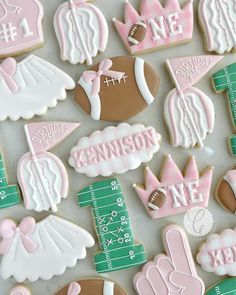 some decorated cookies are laying on a table