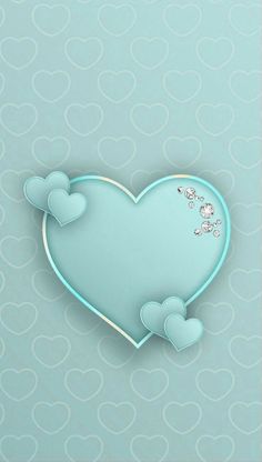 a blue heart shaped card with hearts on the side and two smaller hearts in the middle