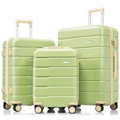 three pieces of green luggage sitting next to each other on casteors with wheels and handles